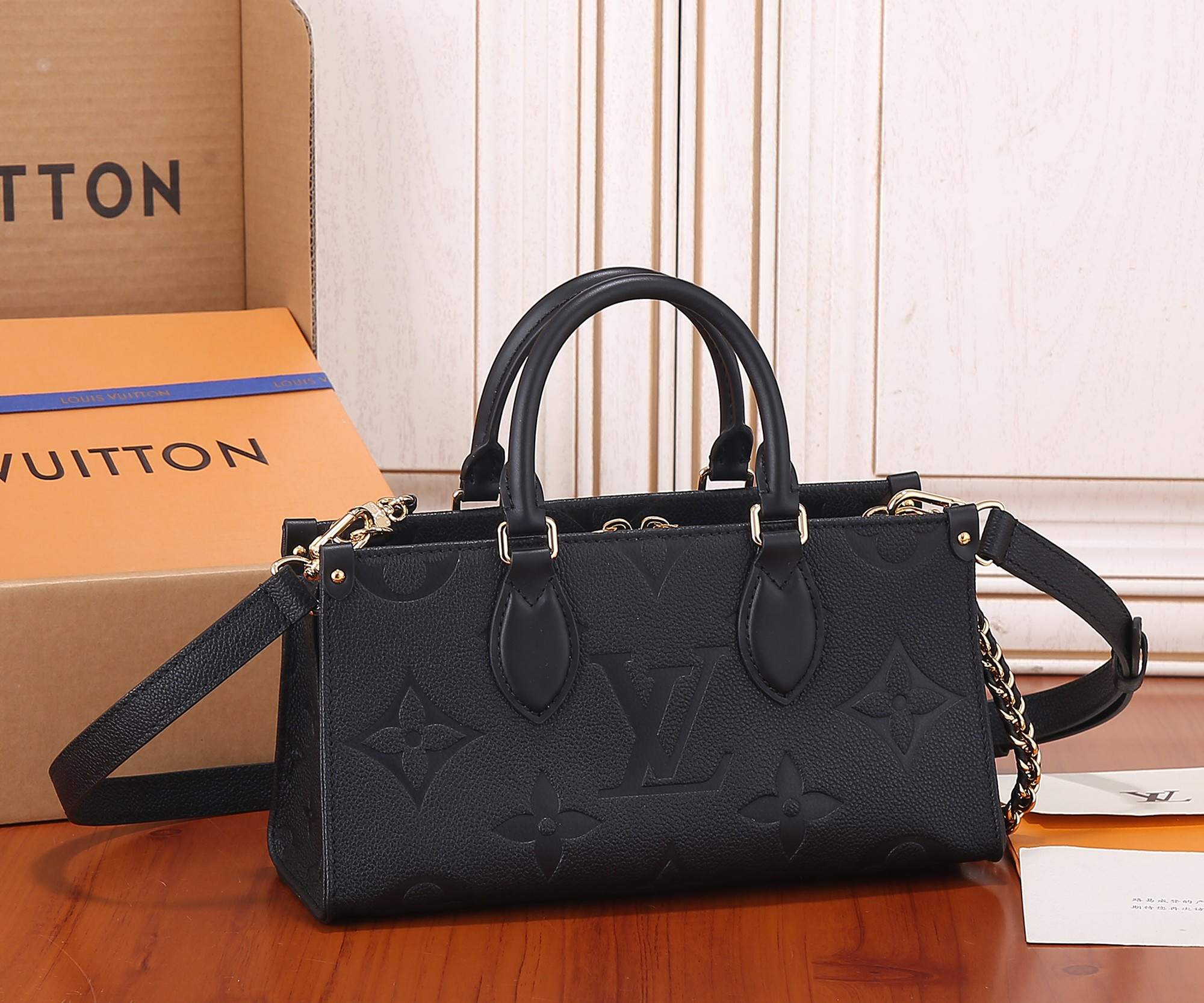 LV OnTheGo East West M23640 9.8 x 5.1 x 3.9 inches