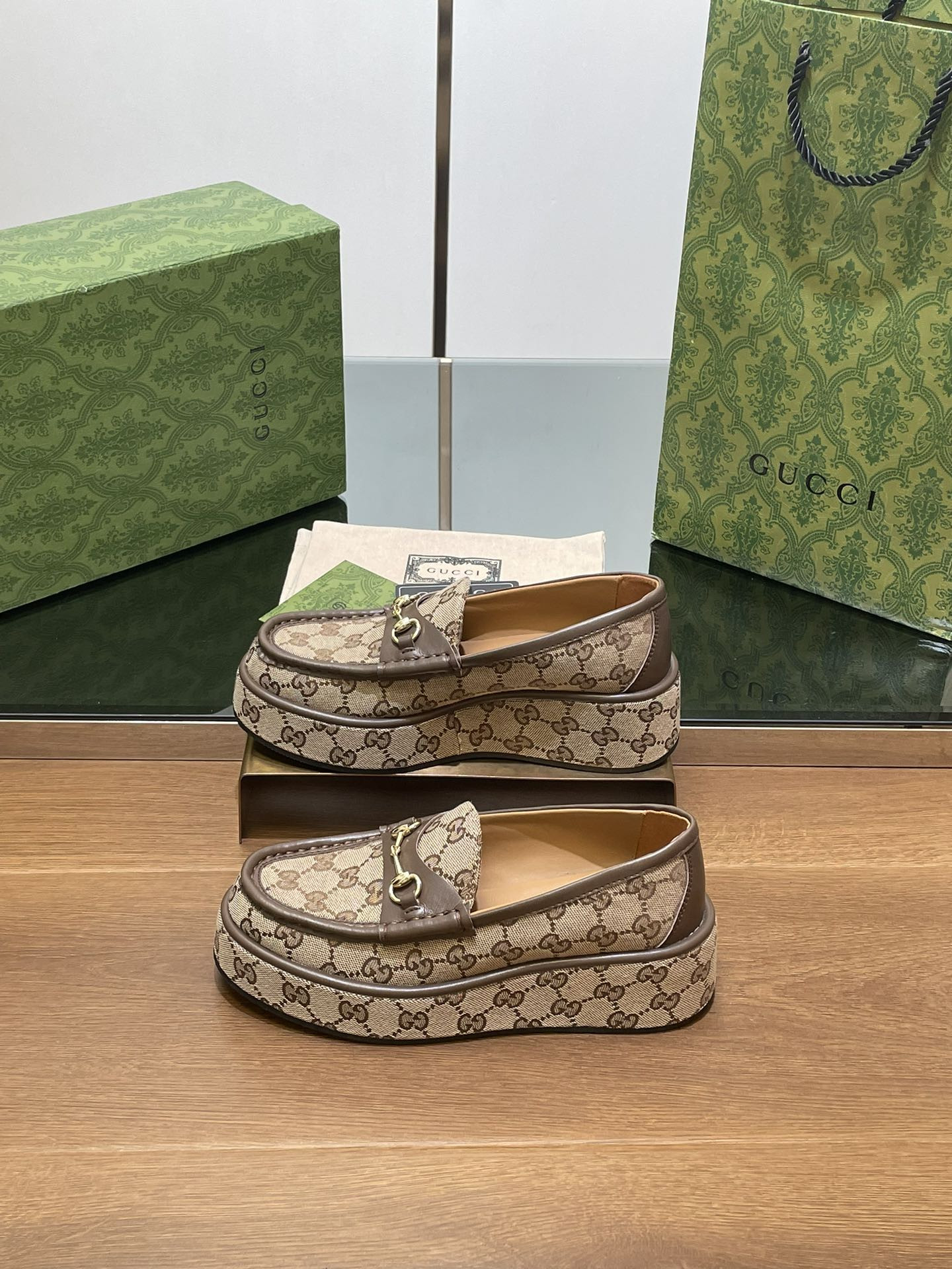 ua G*u*i horsebit wedge loafer